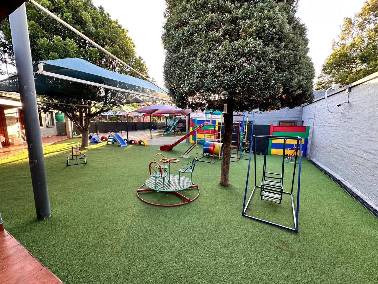 Outdoor swings, merry-go-round and climbing frame